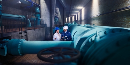 Engineer in front of a wastewater plant