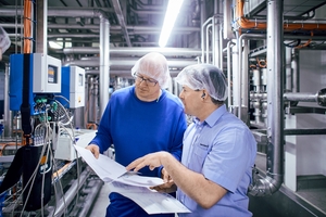 Calibration experts at work in a dairy